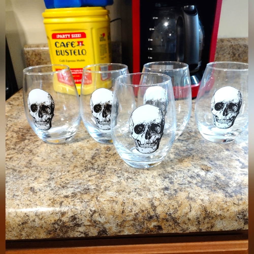Set of 5 celebrate! Skull embossed glasses.